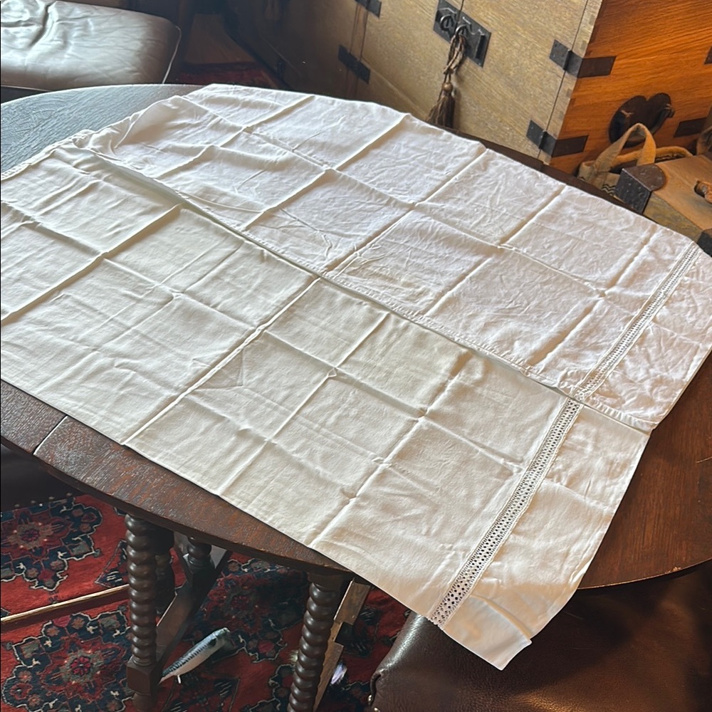 2 white king sized pillowcases. 100% Egyptian cotton. Lacey sorta detail EUC